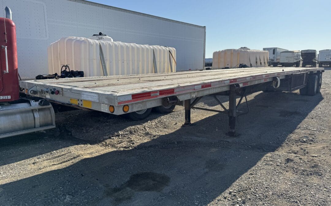1992 Featherlite 45′ flatbed trailer.
